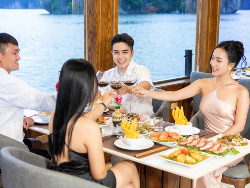 Luxury restaurant on Dcharme Cruise serving delicious buffet lunch during the Half-Day Lan Ha Bay Tour