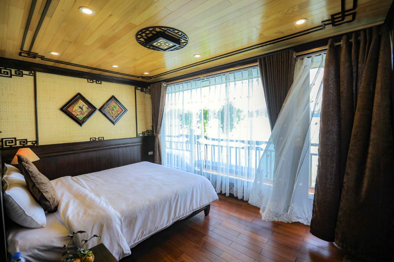 Phòng ngủ sang trọng trên du thuyền Cozy Boutique Vịnh Lan Hạ - Tour Du Thuyền Vịnh Lan Hạ 2 Ngày 1 Đêm   