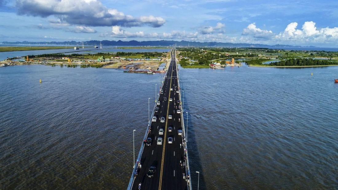 Bus crossing Tan Vu - Lach Huyen sea bridge on the way from Ninh Binh to Cat Ba Island