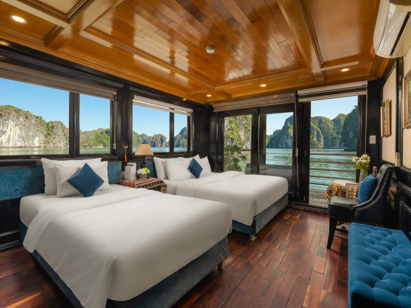 Cozy boutique cabin with large windows and ocean view on the Authentic Lan Ha Bay Cruise