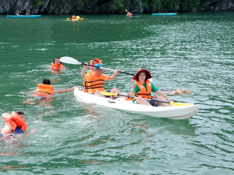 Kayaking around majestic limestone karsts and hidden lagoons in Lan Ha Bay