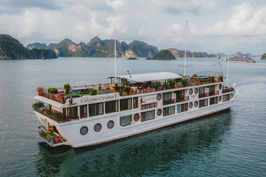 Guests enjoying a timeless experience on Lan Ha Bay from the spacious sundeck