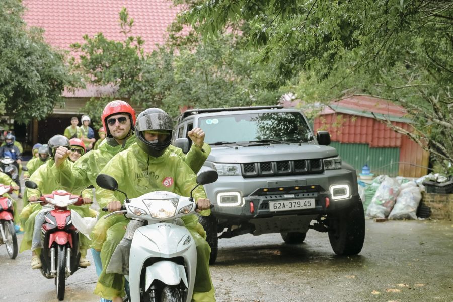 Tourist enjoying a safe ride with an expert guide on the Ha Giang Easy Rider 4 days tour