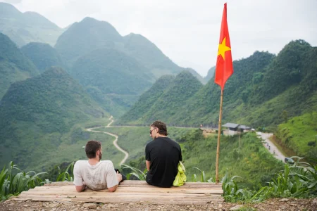 Adventure traveler enjoying the scenic Ha Giang Loop 3 day 2 night tour with a professional Easy Rider guide