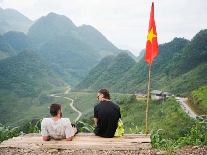 Adventure traveler enjoying the scenic Ha Giang Loop 3 day 2 night tour with a professional Easy Rider guide