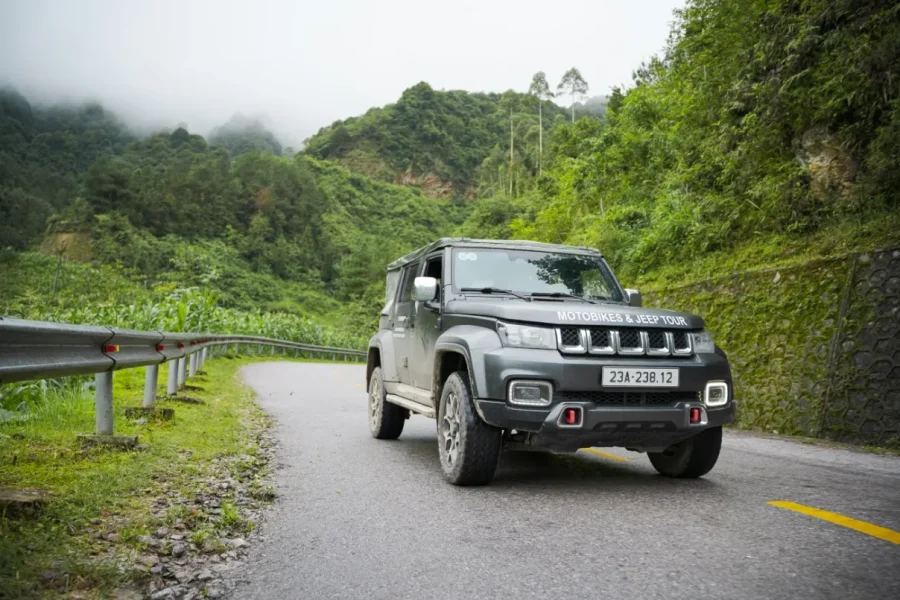 Premium Ha Giang Loop Jeep tour 3 days featuring modern open-top 4x4 cars and professional drivers for a small group adventure.